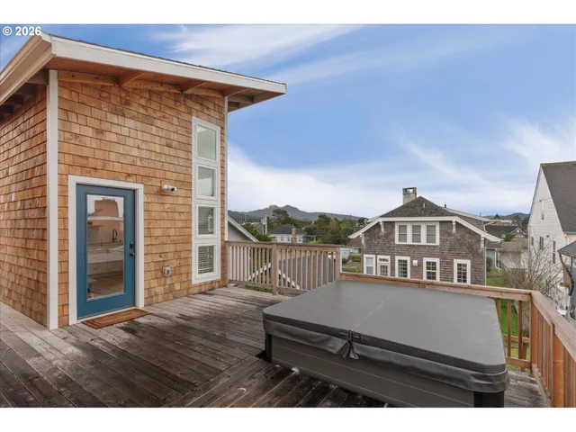 a view of a house with a roof deck
