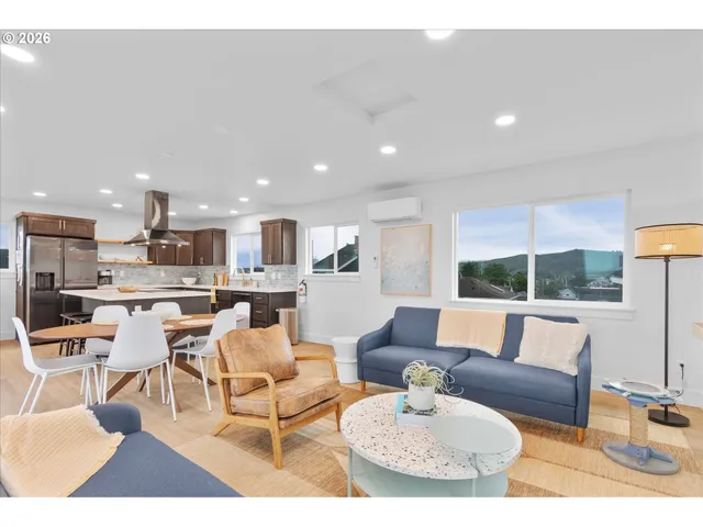 a living room with furniture and a table