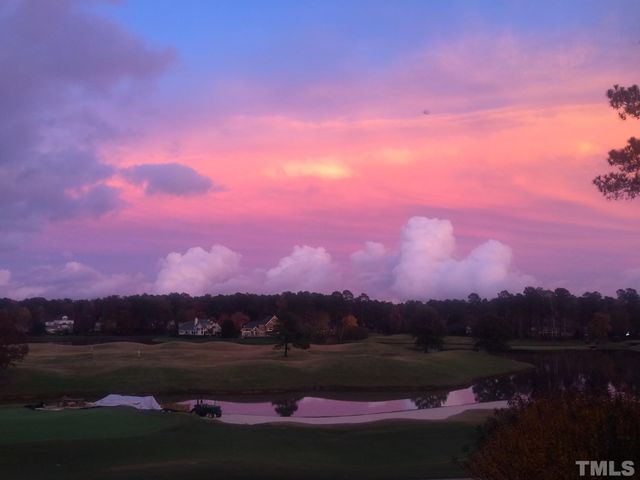 a view of sunset and lake