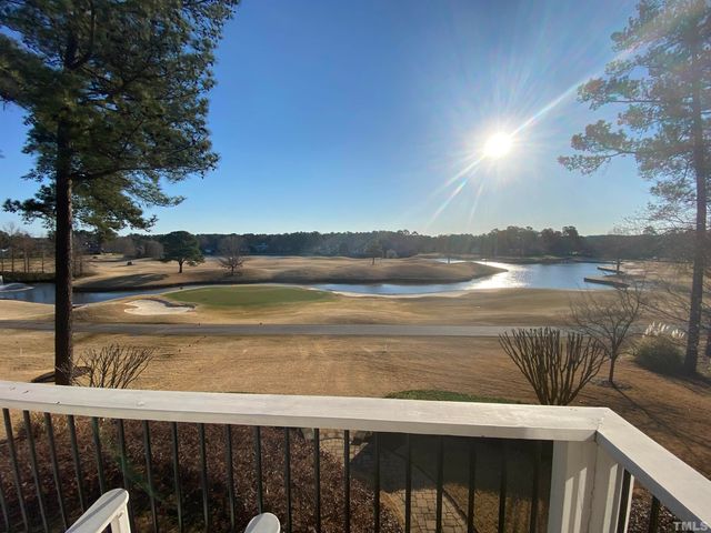 a view of outside space with a lake view