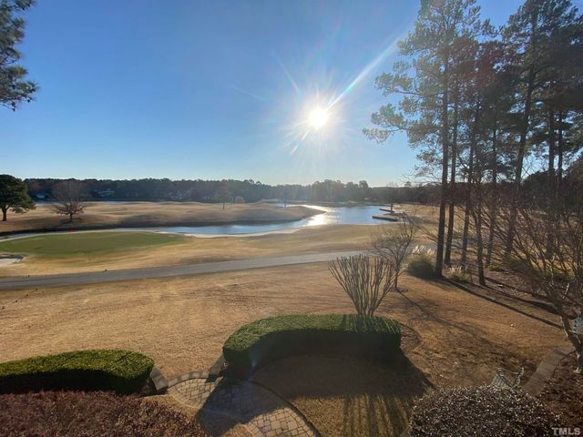 a view of a lake with a outdoor space