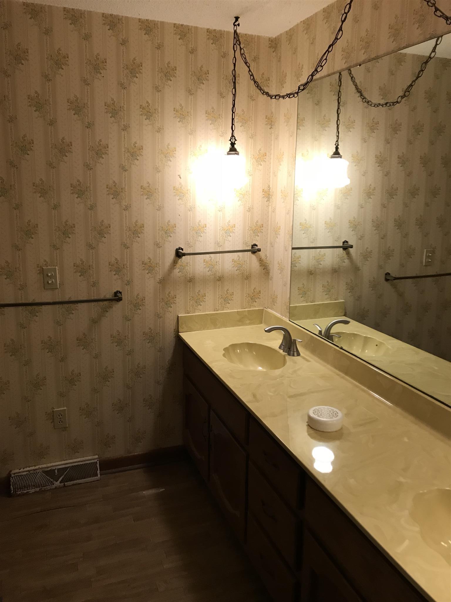 101 Hayes Road Goodspring, TN 38460 - Photo 13 of 22 a bathroom with a sink and a mirror