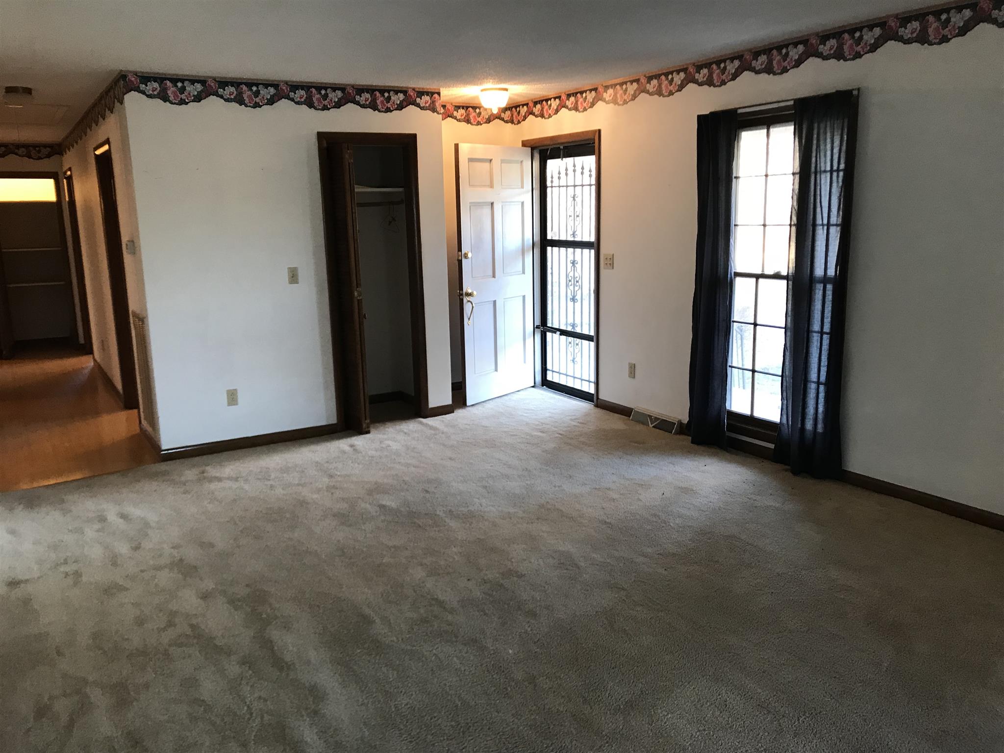 101 Hayes Road Goodspring, TN 38460 - Photo 4 of 22 a view of an empty room with a window
