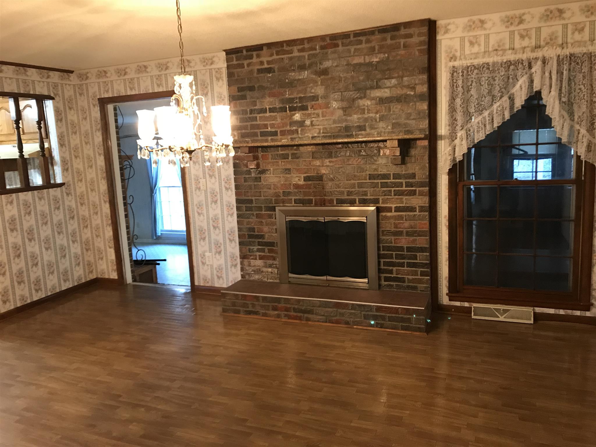 101 Hayes Road Goodspring, TN 38460 - Photo 8 of 22 a view of a livingroom with fireplace and window