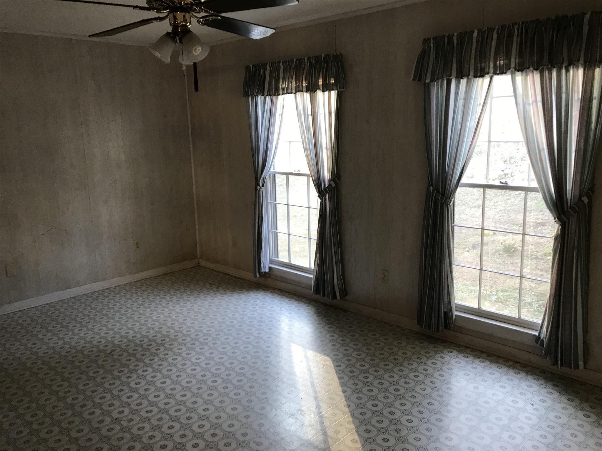 101 Hayes Road Goodspring, TN 38460 - Photo 9 of 22 an empty room with a window