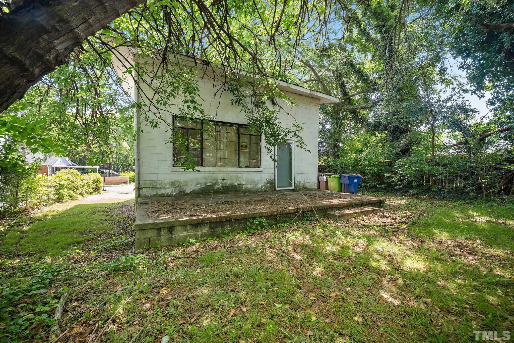 210 Lincoln Court Raleigh, NC 27610 - Photo 3 of 12 a view of a house with a yard