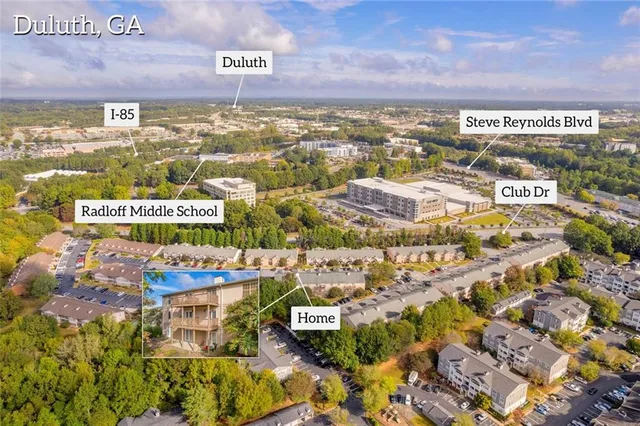 a sign that is on a brick wall