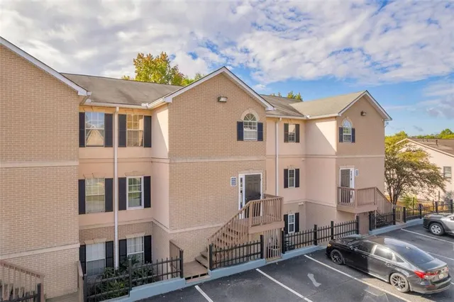 a view of a hallway with windows