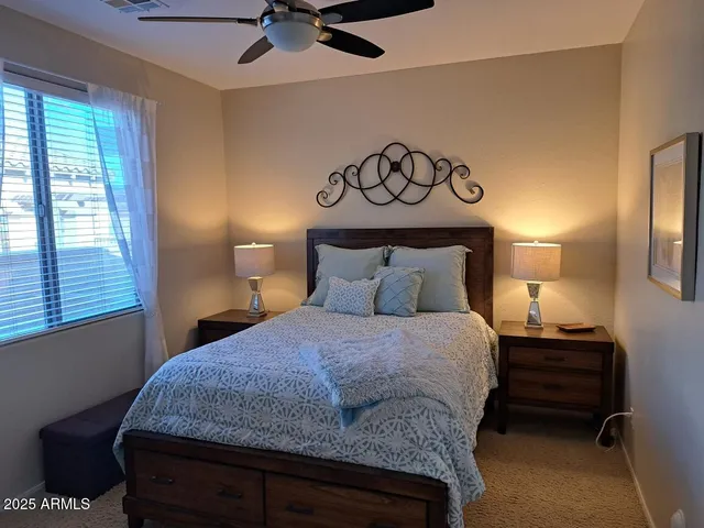 a kitchen with a sink a stove and cabinets