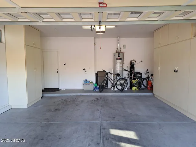 a view of a swimming pool with a yard