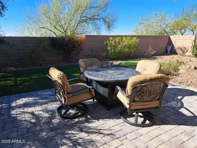 a view of a lake with a palm trees