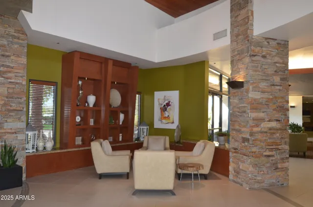 a blue room with bookshelf and a book shelf