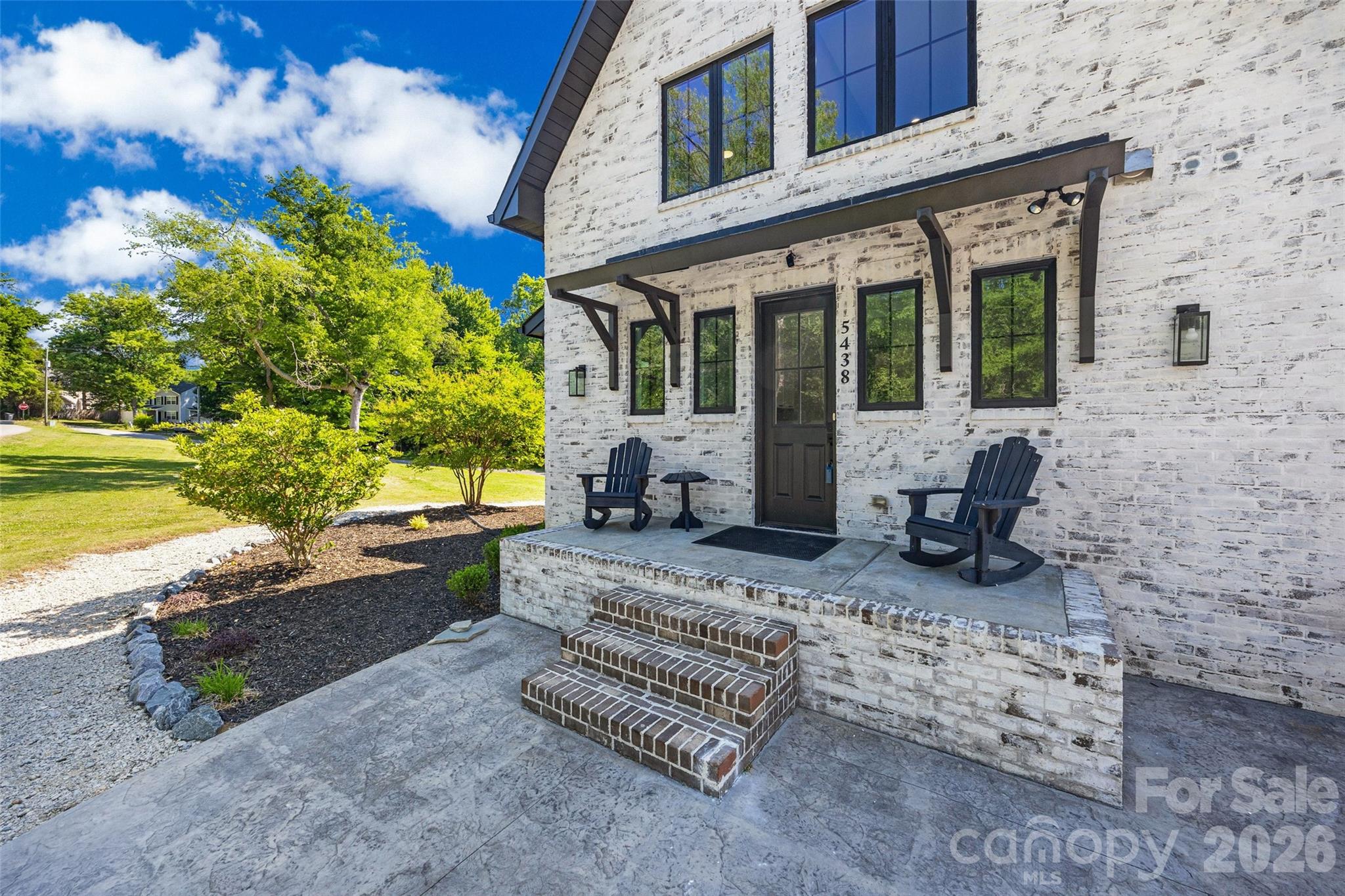 5438 Ralph Harper Lane Clover, SC 29710 - Photo 5 of 28 a view of a house with backyard sitting area and garden