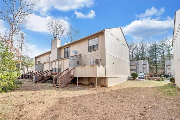 a view of a back yard of the house