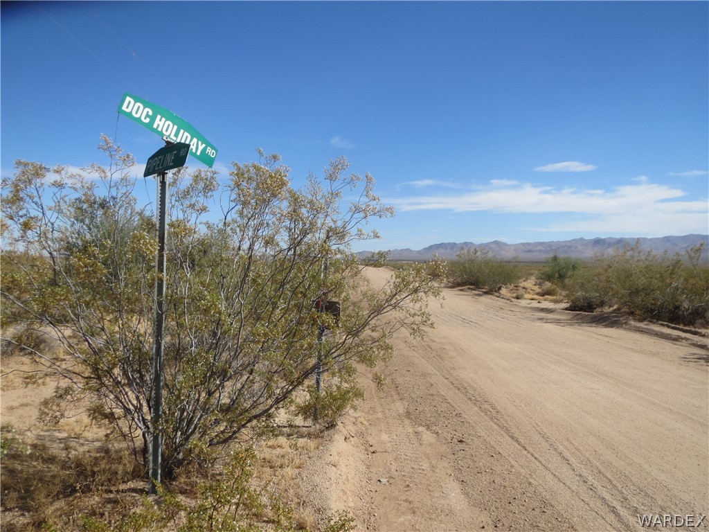 19157 Doc Holliday Road Yucca, AZ 86438 - Photo 4 of 14 a view of a dry yard
