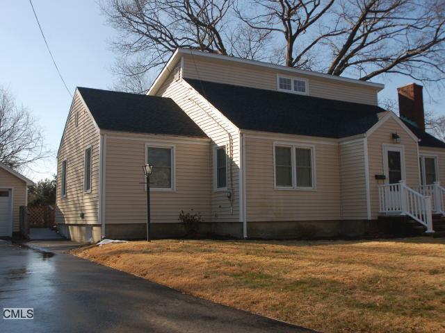 a house that has a window in front of it