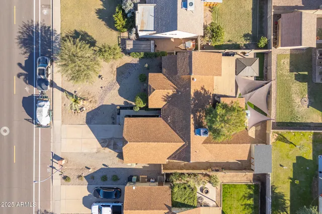 an aerial view of a house with a garden