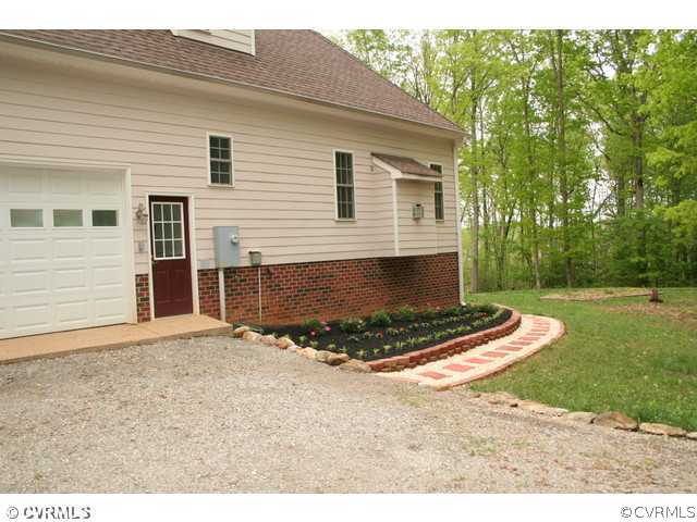 1024 Schroeder Road Powhatan, VA 23139 - Photo 3 of 24 Exterior Back - The side of the home features the