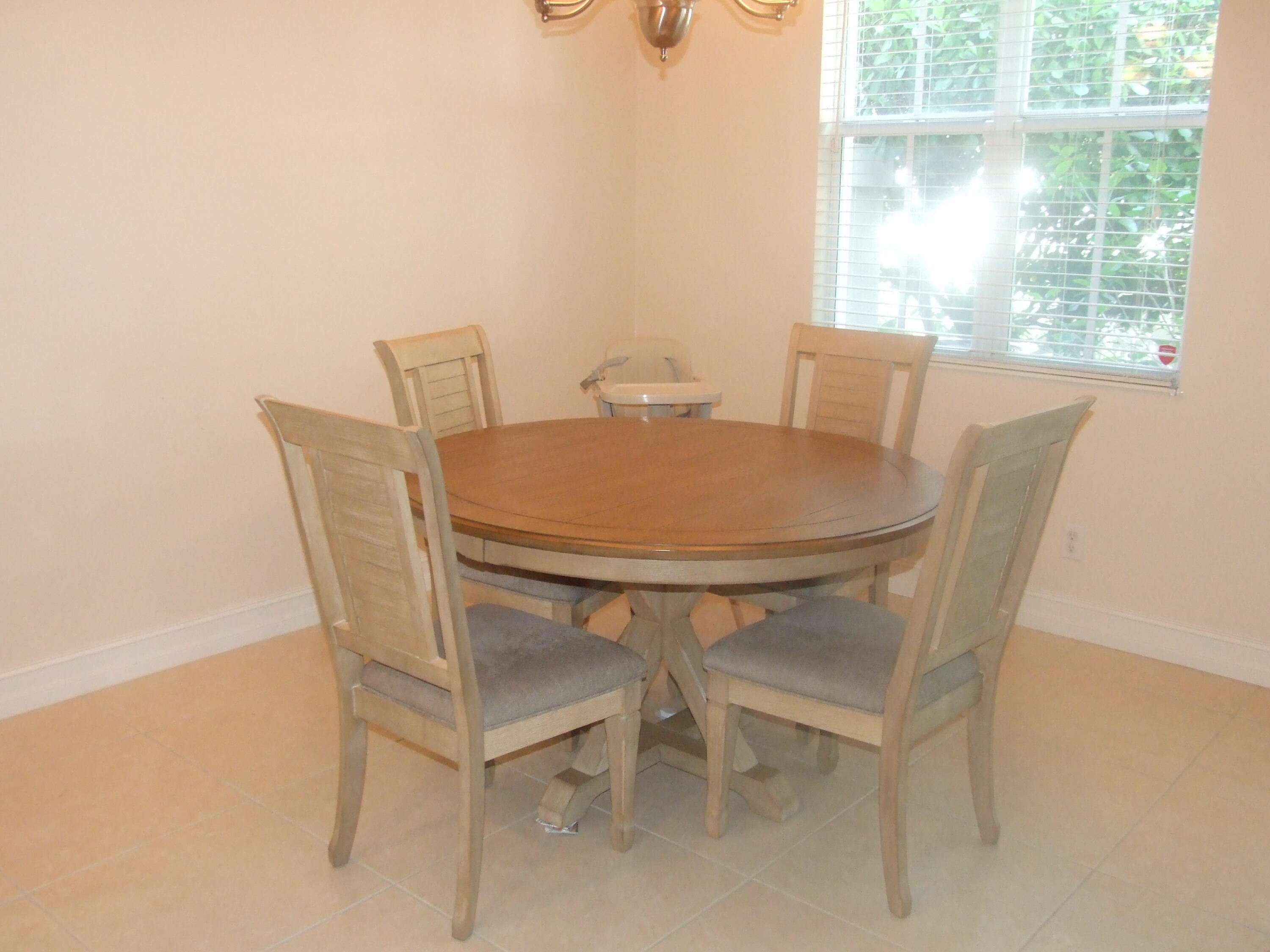 1000 North Us Highway West, Unit 809 Jupiter, FL 33477 - Photo 5 of 21 a dining room with furniture and window