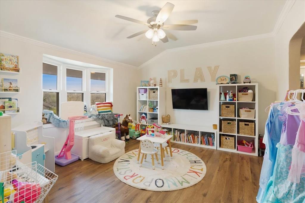 90 Williams Trail Howe, TX 75459 - Photo 11 of 18 a living room with furniture and a flat screen tv