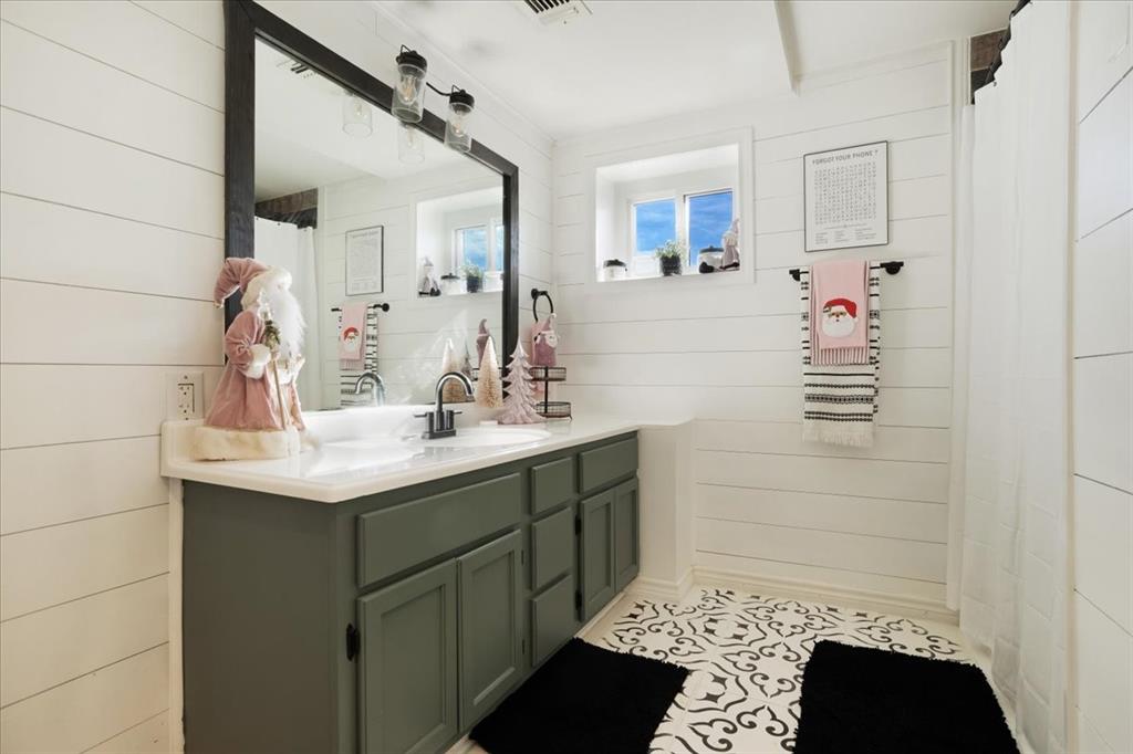 90 Williams Trail Howe, TX 75459 - Photo 13 of 18 a bathroom with a sink and a mirror