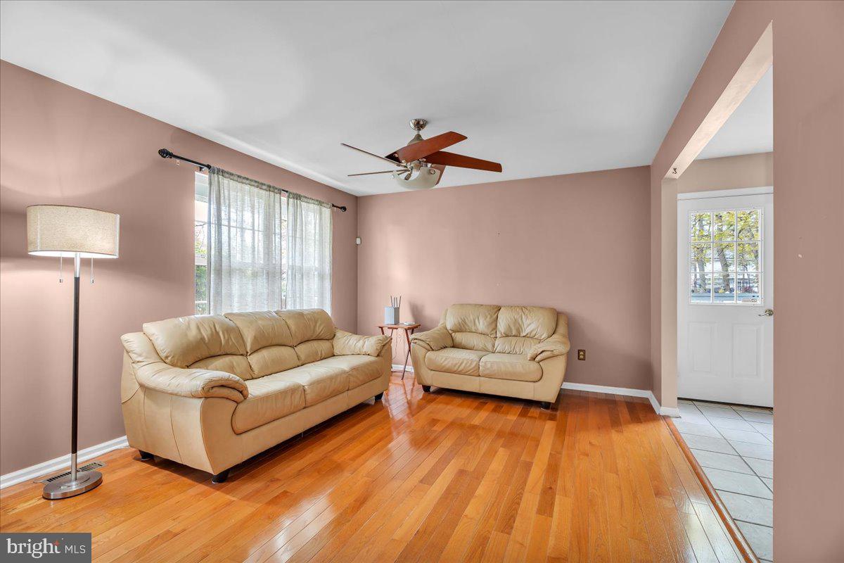 48 Country Club Road Pine Hill, NJ 08021 - Photo 13 of 40 a living room with furniture and wooden floor