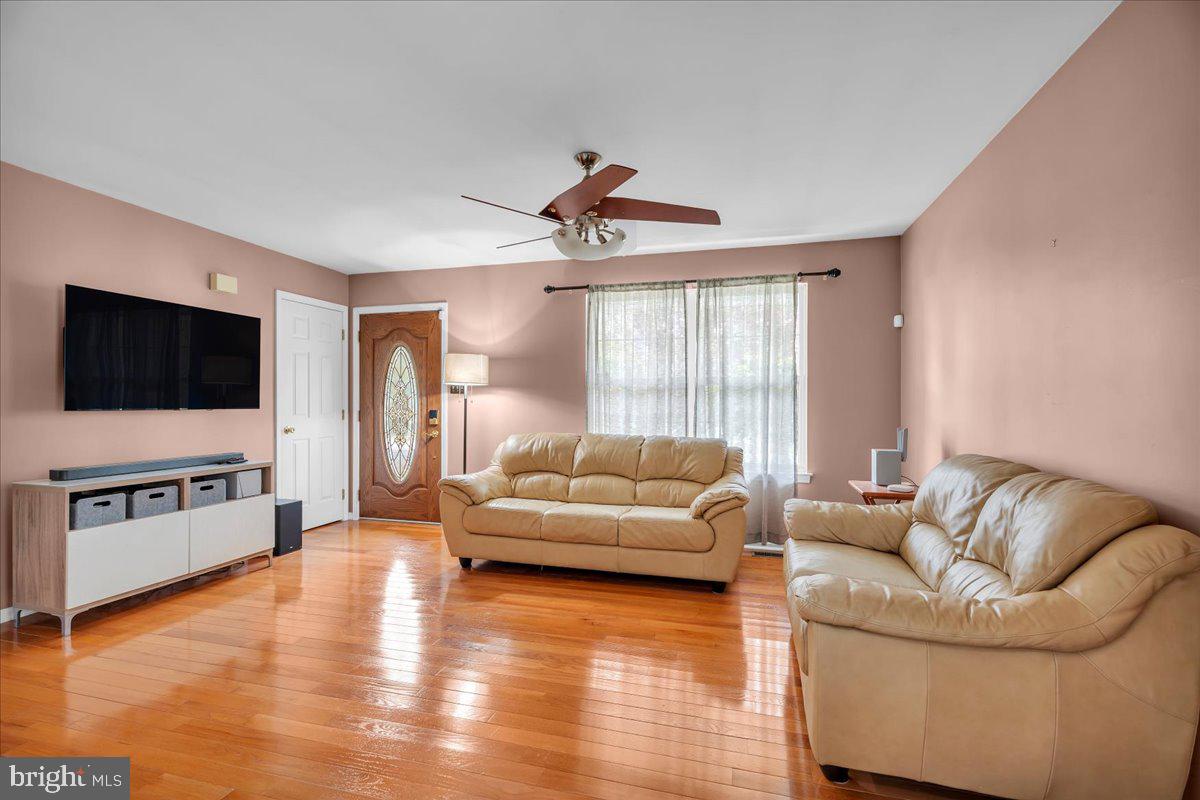 48 Country Club Road Pine Hill, NJ 08021 - Photo 14 of 40 a living room with furniture and a flat screen tv