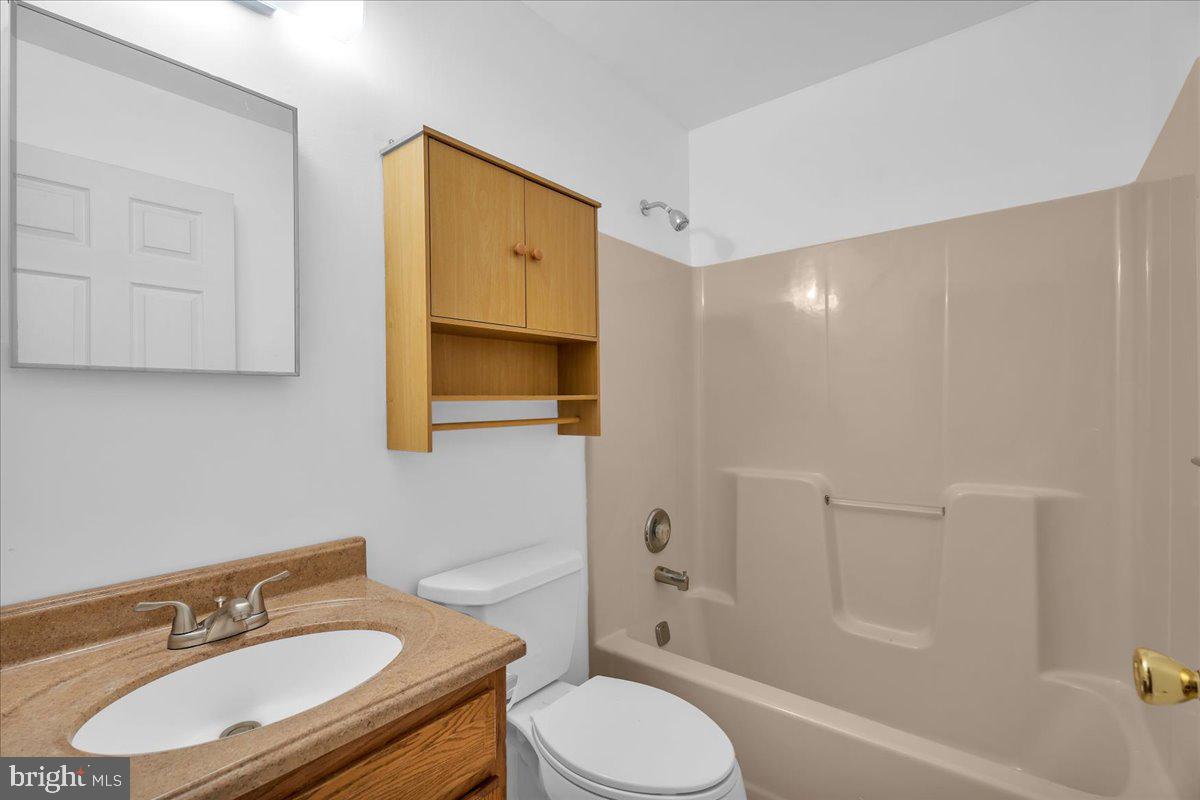 48 Country Club Road Pine Hill, NJ 08021 - Photo 23 of 40 a bathroom with a sink toilet and shower
