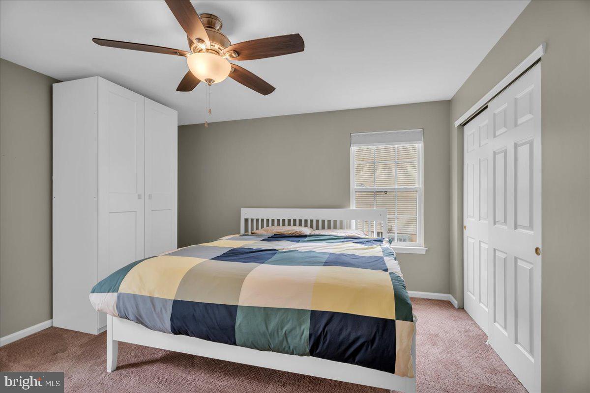 48 Country Club Road Pine Hill, NJ 08021 - Photo 25 of 40 a bedroom with a bed and a ceiling fan