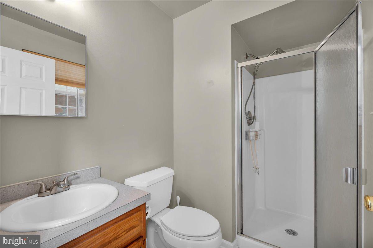48 Country Club Road Pine Hill, NJ 08021 - Photo 26 of 40 a bathroom with a sink toilet and shower