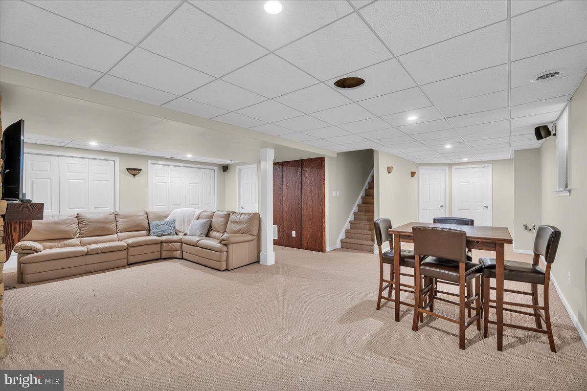 48 Country Club Road Pine Hill, NJ 08021 - Photo 27 of 40 a living room with furniture and a table