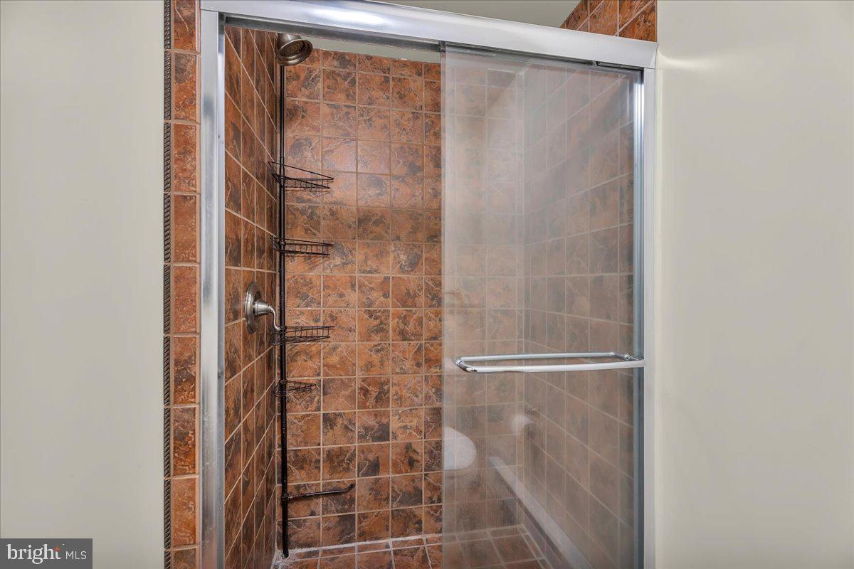 48 Country Club Road Pine Hill, NJ 08021 - Photo 31 of 40 a bathroom with a glass shower door