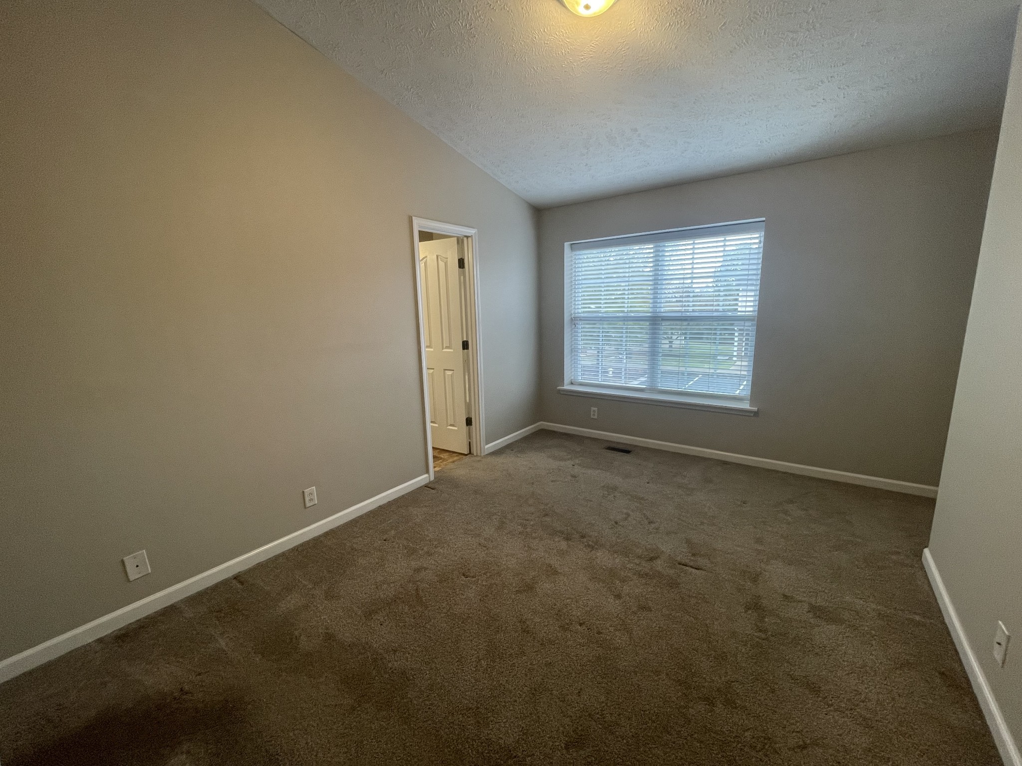 2037 Victory Gallop Lane Murfreesboro, TN 37128 - Photo 12 of 20 an empty room with a empty space and windows
