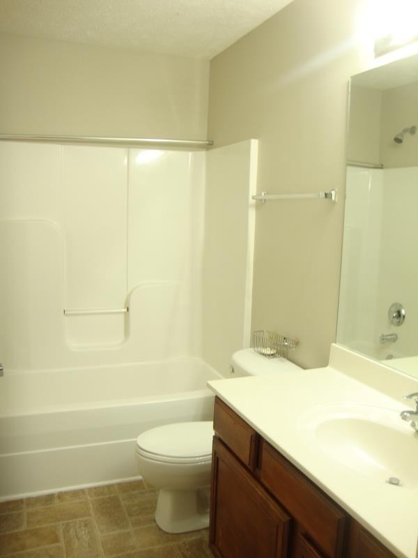 2037 Victory Gallop Lane Murfreesboro, TN 37128 - Photo 16 of 20 a bathroom with a sink a toilet and shower