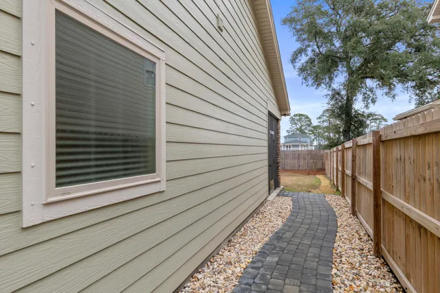 a view of a house with backyard and porch