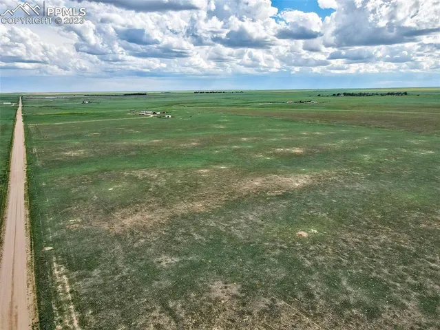 a view of field with grass and sky view