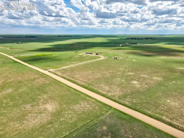 a view of an outdoor space and tennis court