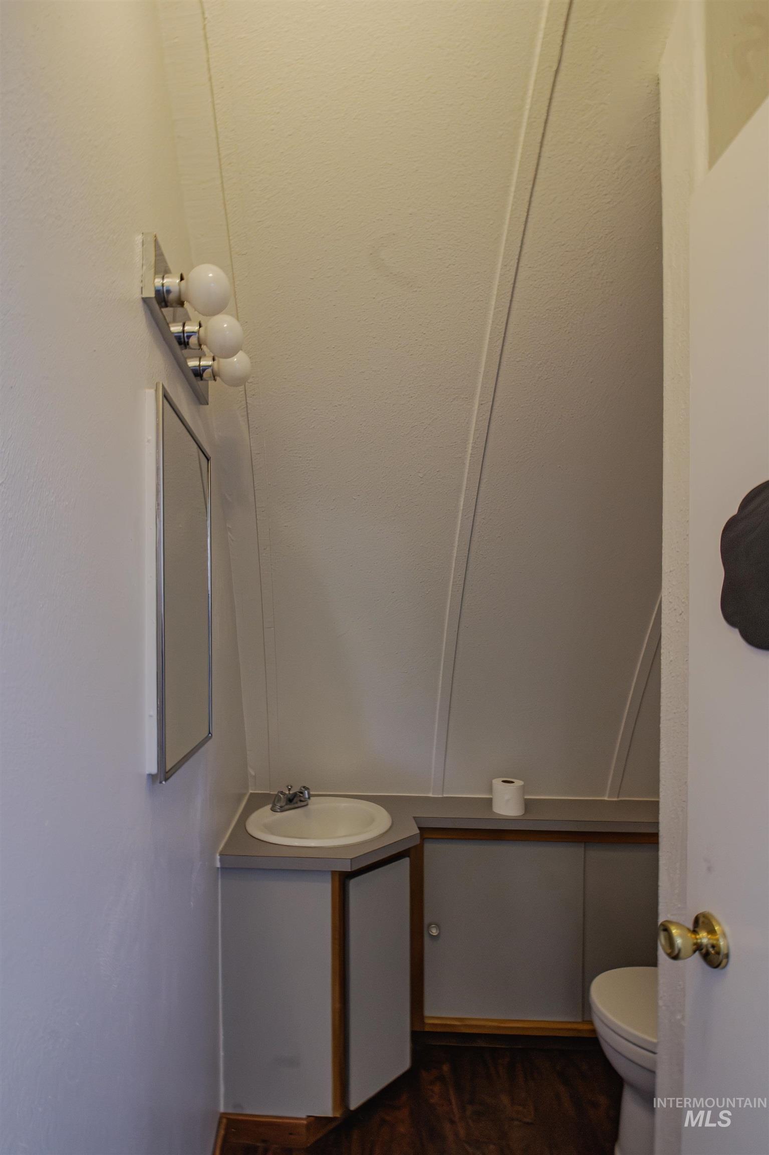 161 Southeast 5th Avenue Ontario, OR 97914 - Photo 18 of 41 Bathroom featuring vanity and wood finished floors