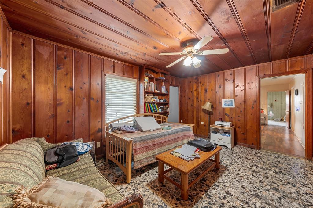 812 Hubert Street Waco, TX 76704 - Photo 11 of 22 a living room with furniture a table and a large window