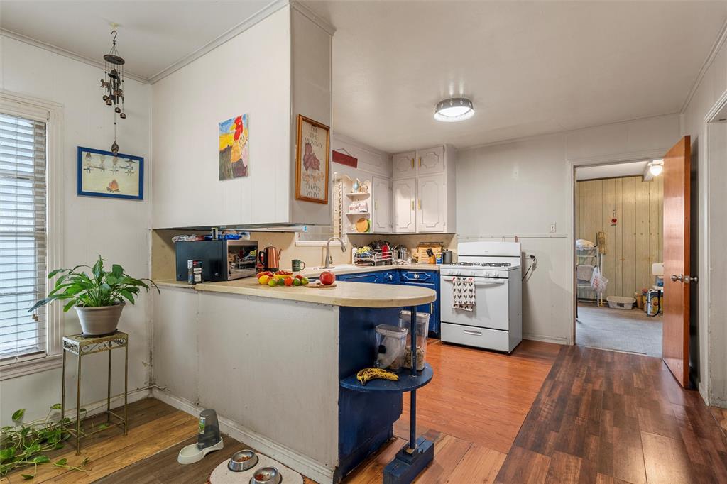 812 Hubert Street Waco, TX 76704 - Photo 13 of 22 a kitchen with a sink appliances and cabinets