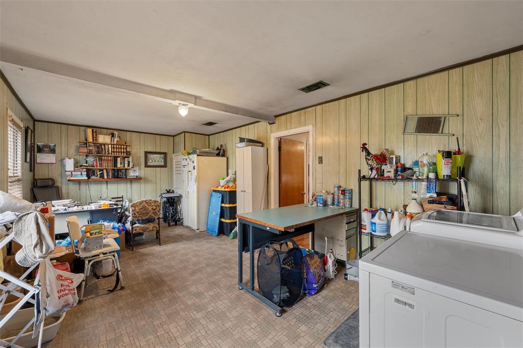 812 Hubert Street Waco, TX 76704 - Photo 17 of 22 a room with lots of furniture and clutter