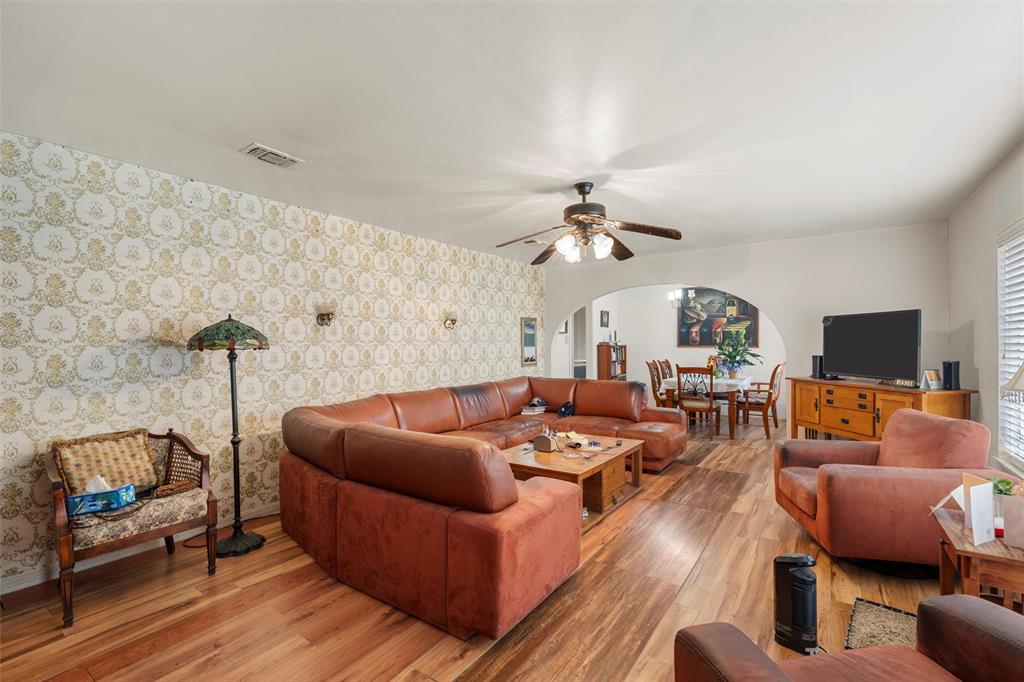 812 Hubert Street Waco, TX 76704 - Photo 20 of 22 a living room with furniture and a flat screen tv