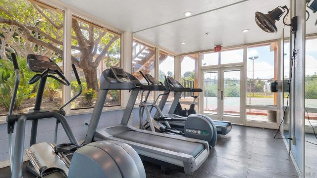 a view of a living room and dining room