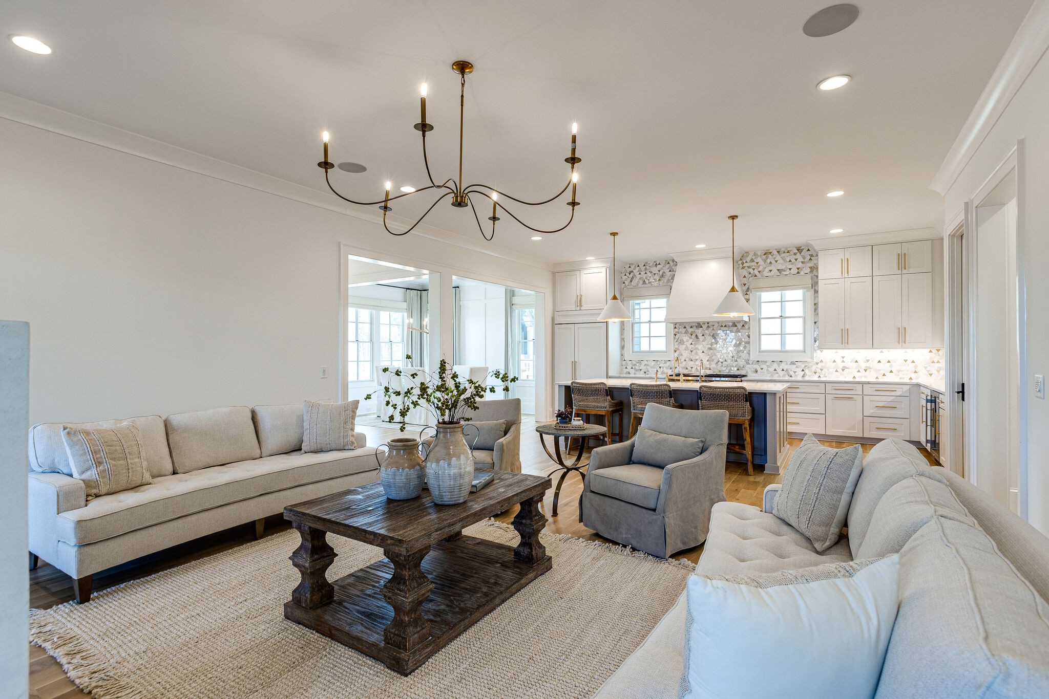 2025 Kathryn Avenue Franklin, TN 37064 - Photo 15 of 69 a living room with furniture kitchen view and a chandelier