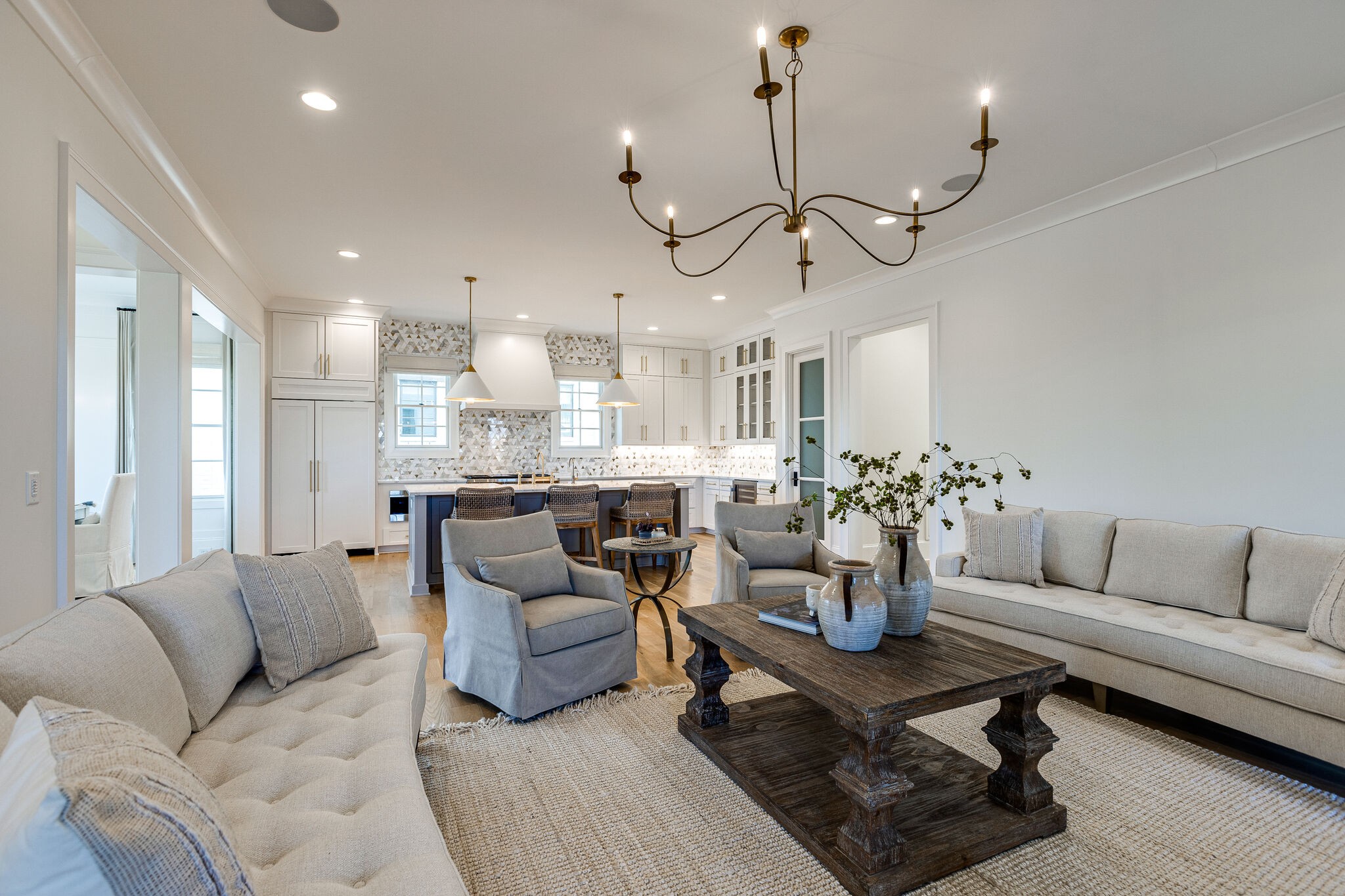 2025 Kathryn Avenue Franklin, TN 37064 - Photo 16 of 69 a living room with furniture kitchen view and a chandelier