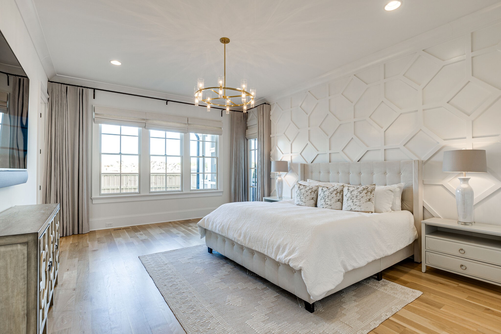 2025 Kathryn Avenue Franklin, TN 37064 - Photo 30 of 69 a bedroom with a large bed and a wooden floor