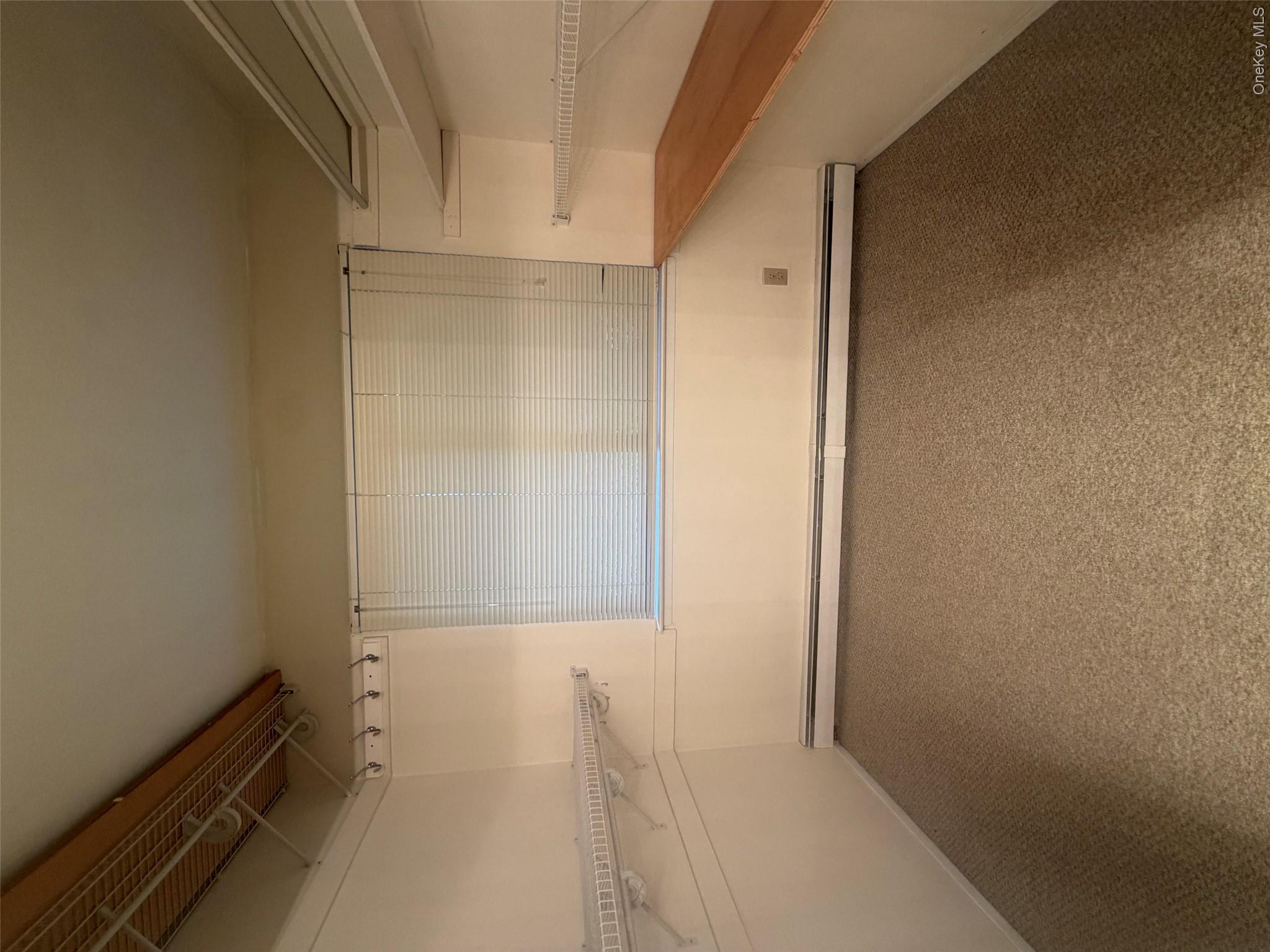 75 Greenway Close, Unit 75 Rye Brook, NY 10573 - Photo 18 of 23 Primary walk-in closet