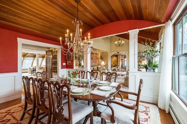 a view of a dining room with furniture window and outside view