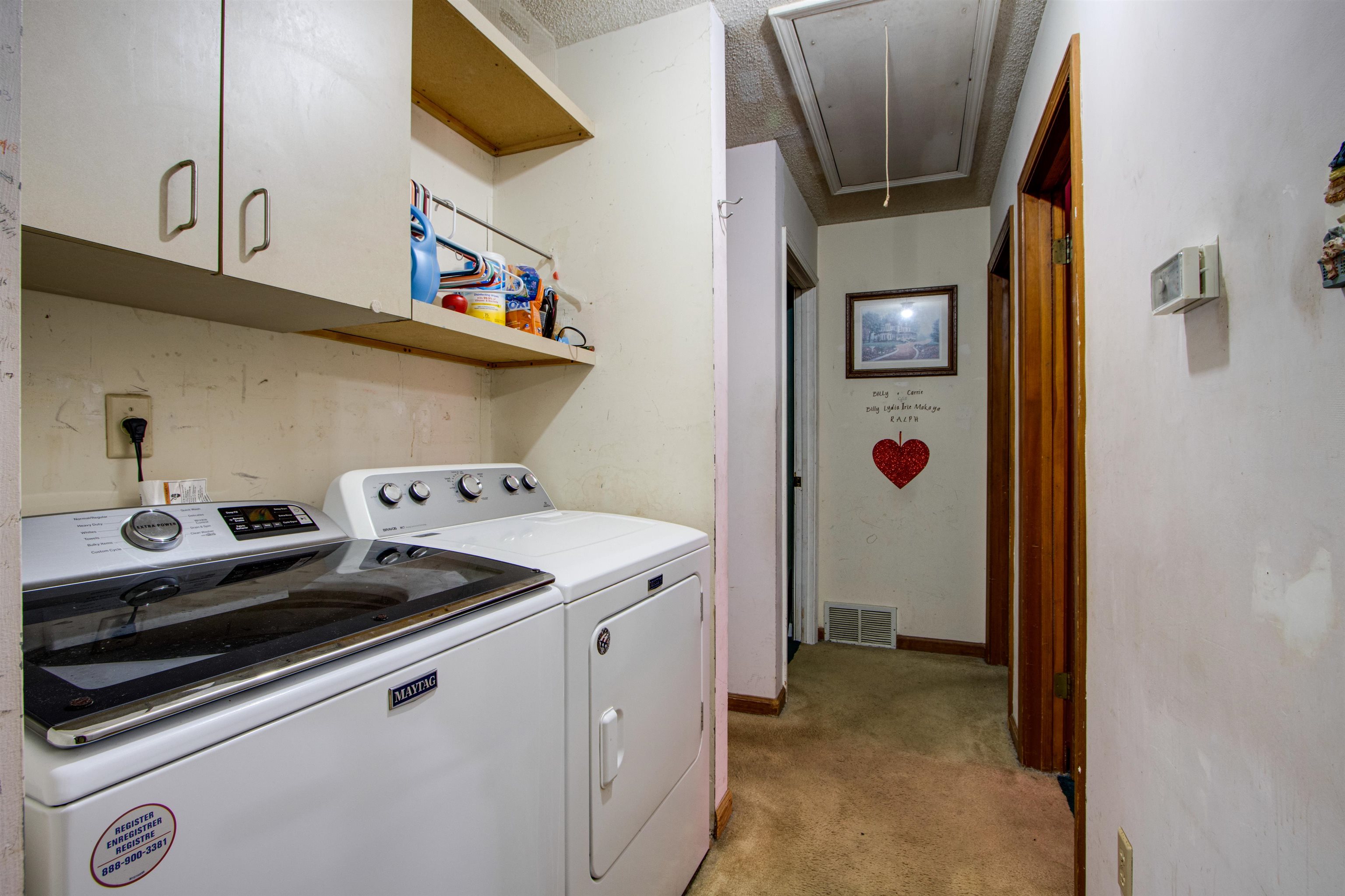 6498 Wimble Road Memphis, TN 38134 - Photo 8 of 23 a utility room with dryer and washer