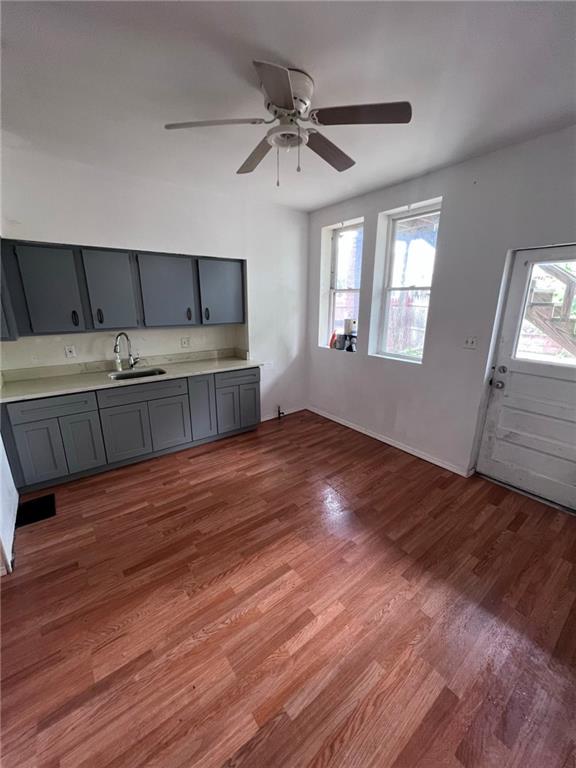 84 Frazier Avenue McKees Rocks, PA 15136 - Photo 4 of 14 a view of an empty room with wooden floor and a window
